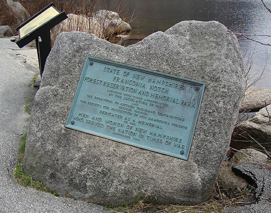 The Franconia Notch Forest Reservation and Memorial Park monument on Profile Lake
